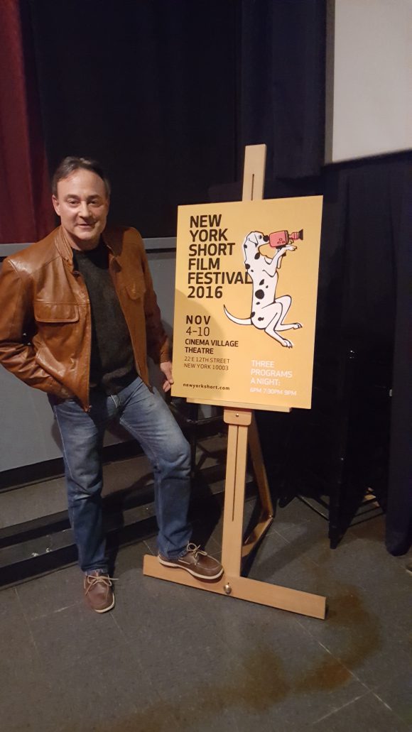 Alan Fine with New York Short Film Festival 2016 poster